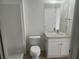Bright bathroom with walk in shower, white vanity, and modern fixtures at 14656 Wake Robin Dr, Brooksville, FL 34604