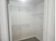 Walk-in closet features wire shelving and carpet flooring at 14656 Wake Robin Dr, Brooksville, FL 34604