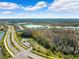 Beautiful aerial view of a Primary planned community with lakes, green spaces and manicured landscaping at 15793 Midnight Dove Ct, Odessa, FL 33556