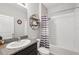 Bright bathroom with granite countertop, updated fixtures, and stylish decor at 15793 Midnight Dove Ct, Odessa, FL 33556