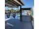 Covered dock area with built-in sink and seating at 18345 Hottelet Cir, Port Charlotte, FL 33948