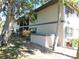 Exterior view of a well maintained two-story home at 19505 Quesada Ave # Bb-103, Port Charlotte, FL 33948