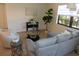 Bright living room featuring a comfortable sofa and modern decor at 19505 Quesada Ave # Bb-103, Port Charlotte, FL 33948