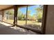 Spacious backyard featuring screened lanai overlooking well-maintained lawn at 2158 Fentress Ct, Spring Hill, FL 34609