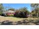 Charming single-Gathering home with lush landscaping and a well-manicured front yard at 2158 Fentress Ct, Spring Hill, FL 34609
