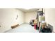 Garage features storage space and white cinderblock walls at 2158 Fentress Ct, Spring Hill, FL 34609