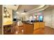 Kitchen with wood cabinets, granite countertops, stainless steel appliances, and breakfast nook at 2158 Fentress Ct, Spring Hill, FL 34609
