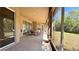 Covered patio offers space for outdoor dining, lounging, and enjoying views of the backyard at 2158 Fentress Ct, Spring Hill, FL 34609
