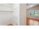 An empty closet that is part of the house, next to the main bedroom at 303 Rochester St, Spring Hill, FL 34609