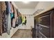 Walk-in closet with shelving and clothing racks, providing ample storage space and organization at 3450 Dow Lane, Spring Hill, FL 34608