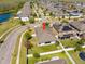 This aerial view highlights the neighborhood, landscaping and surrounding community features at 3600 Tuckerton Dr, Land O Lakes, FL 34638