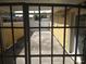 Gated access to the backyard, showing the exterior and surrounding areas at 4607 N Saint Vincent St, Tampa, FL 33614