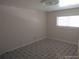 Bedroom featuring bright natural light and tile flooring at 4607 N Saint Vincent St, Tampa, FL 33614