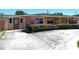 Charming ranch-style home featuring mature landscaping, a concrete driveway, and well-maintained exterior at 4607 N Saint Vincent St, Tampa, FL 33614