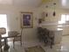 Cozy kitchen with a breakfast bar, tiled floors, and an adjacent dining area at 4607 N Saint Vincent St, Tampa, FL 33614