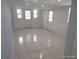 Bright living room featuring recessed lighting and tile flooring at 4607 N Saint Vincent St, Tampa, FL 33614
