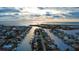 Beautiful aerial view of waterfront homes along a canal, leading out to the open water at 4964 Cedarbrook Ln, Hernando Beach, FL 34607