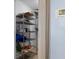 A functional basement space featuring metal shelving for organized storage solutions at 4964 Cedarbrook Ln, Hernando Beach, FL 34607