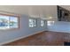 Bright bonus room featuring hardwood floors, lots of natural light and canal views at 4964 Cedarbrook Ln, Hernando Beach, FL 34607