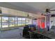 Inviting screened patio boasts waterfront views, dining, and relaxation areas for peaceful enjoyment at 4964 Cedarbrook Ln, Hernando Beach, FL 34607