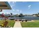 Scenic water view from the backyard patio, showcasing serene water views and relaxing outdoor space at 4964 Cedarbrook Ln, Hernando Beach, FL 34607