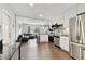 Updated kitchen features granite countertops and stainless steel appliances at 6250 Vermont Ave, New Port Richey, FL 34653