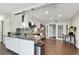 Kitchen with white cabinets, stainless steel appliances, and granite countertops at 6250 Vermont Ave, New Port Richey, FL 34653