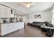 Open concept living space featuring view of the kitchen with large counter for entertaining at 6250 Vermont Ave, New Port Richey, FL 34653