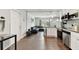 Open floor plan offers a view of the living room from the updated kitchen at 6250 Vermont Ave, New Port Richey, FL 34653