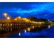 Beautiful waterfront view at night, reflecting lights on the calm water near the bridge at 6250 Vermont Ave, New Port Richey, FL 34653