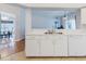 Kitchen with tile floors and access to the dining room at 7239 Sharpsburg Blvd, New Port Richey, FL 34653
