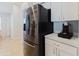 Kitchen featuring a stainless steel Samsung refrigerator at 7239 Sharpsburg Blvd, New Port Richey, FL 34653