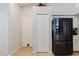 Kitchen area with black stainless steel Samsung refrigerator at 7239 Sharpsburg Blvd, New Port Richey, FL 34653