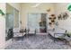 Outdoor patio with comfortable seating, decorative decor, and peaceful pool view at 7239 Sharpsburg Blvd, New Port Richey, FL 34653