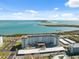 High angle view of a condominium complex with beautiful water views and nearby covered parking at 9 Forbes Pl # 512, Dunedin, FL 34698