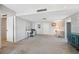 Spacious living room with a work area, comfortable seating, and access to other areas of the home at 9 Forbes Pl # 512, Dunedin, FL 34698