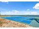 Community shuffleboard court with ocean views and benches for spectators at 9 Forbes Pl # 512, Dunedin, FL 34698