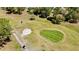 Beautiful aerial view of the golf course with lush green grass and scattered trees at 10200 Swanson Ct, Spring Hill, FL 34608