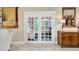 Bonus room featuring French doors leading to the outdoors at 1051 Almondwood Dr, Trinity, FL 34655