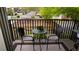 Comfortable balcony with outdoor seating offers scenic views of the surrounding neighborhood at 12820 Wedgewood Way # D, Hudson, FL 34667