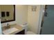 Bathroom with a sink vanity, toilet, and glass-enclosed shower stall at 12820 Wedgewood Way # D, Hudson, FL 34667