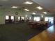 Spacious clubhouse with comfortable seating and large windows at 12820 Wedgewood Way # D, Hudson, FL 34667