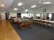 Spacious community room featuring comfortable seating, a TV, and ample space for activities and gatherings at 12820 Wedgewood Way # D, Hudson, FL 34667