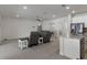 Open-concept living space with seamless flow from kitchen to living area, perfect for entertaining at 14604 Strathglass Dr, Hudson, FL 34667