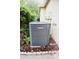 Goodman AC unit surrounded by mulch and greenery at 19109 Beckett Dr, Odessa, FL 33556