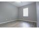 Bright bedroom featuring a ceiling fan and a window at 19109 Beckett Dr, Odessa, FL 33556