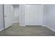 Bedroom with closet and doorway to another room at 19109 Beckett Dr, Odessa, FL 33556