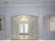 Spacious foyer with elegant archways, and natural light at 19109 Beckett Dr, Odessa, FL 33556