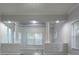 Elegant living room with decorative pillars and detailed trim, offering a sophisticated and inviting atmosphere at 19109 Beckett Dr, Odessa, FL 33556