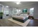 Spacious main bedroom with a luxurious bed, stylish decor, and plenty of natural light, creating a relaxing retreat at 19109 Beckett Dr, Odessa, FL 33556